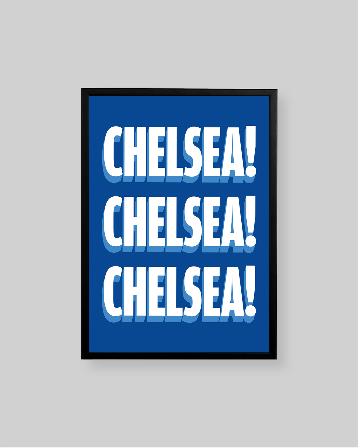 A framed typographic wall art print featuring the word 'CHELSEA!' repeated three times in bold white letters with a blue-and-white shadow effect on a blue background, shown against a light gray wall.