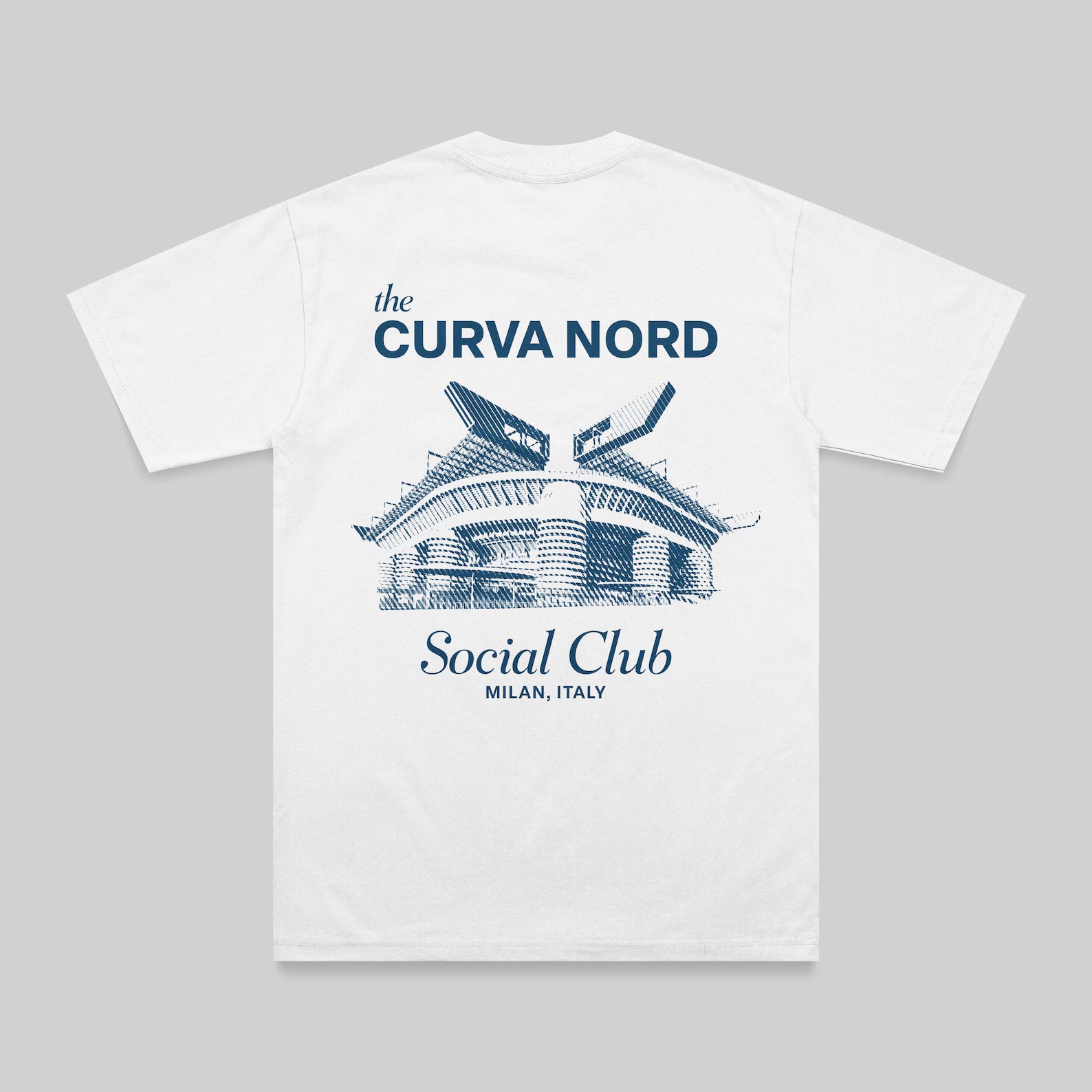 A white short-sleeve t-shirt with a blue graphic print on the back, featuring the text 'the CURVA NORD Social Club MILAN, ITALY' and an illustration of a stadium.
