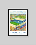 A framed art print of a Leeds United football stadium illustration, featuring the text 'LEEDS UNITED' and 'ELLAND ROAD' at the bottom, displayed against a solid gray background.