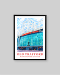 A framed art print of Old Trafford stadium in Manchester United, featuring a vibrant blue and white architectural illustration with red text, displayed on a neutral gray background.