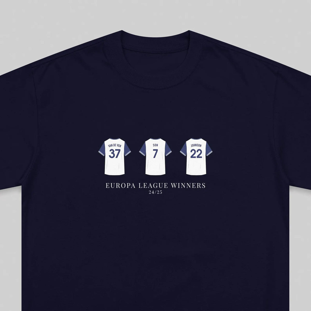 A navy blue crewneck t-shirt featuring a graphic print of three white football jerseys with the numbers 37, 7, and 22, above the text 'EUROPA LEAGUE WINNERS 24/25'.